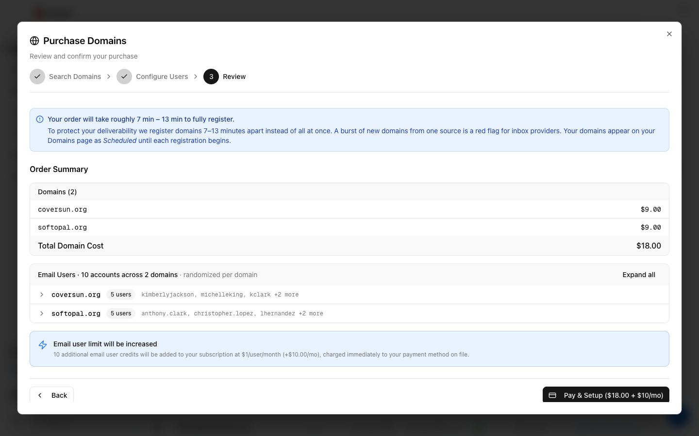 Purchase Review step showing the one-time domain cost, the email-user credit notice, and a Pay and Setup button